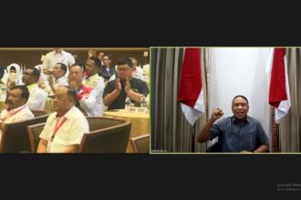 Menteri Pemuda dan Olahraga Republik Indonesia (Menpora RI) Zainudin Amali memberi arahan secara virtual pada Rapat Kerja Nasional (Rakernas) KONI Pusat, dari Bandara Internasional Ngurah Rai, Bali, Senin (13/3) pagi.(foto:egan/kemenpora.go.id)