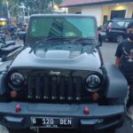 Penampakan Jeep Rubicon warna hitam nopol B 120 DEN yang menjadi barang bukti dari tersangka penganiayaan Mario Dandy Satriyo, 20, saat diamankan di Mapolres Metro Jakarta Selatan, belum lama ini. Foto: Joesvicar Iqbal/ipol.id