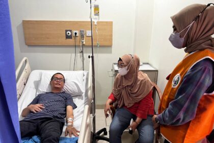 Mochamad Nur Insya saat disambagi petugas BPJS Ke