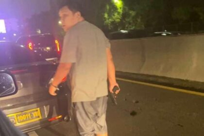 Viral aksi pria tenteng pistol di tol Foto tangkapan layar