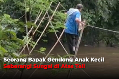 Seorang Bapak Gendong Anak Kecil Seberangi Sungai di Atas Tali