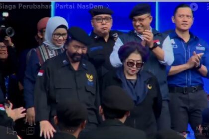 Ketua Umum Partai Demokrat, AHY, menghadiri apel akbar partai Nasdem, dihadiri Surya Paloh dan Presiden PKS.