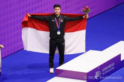 im Indonesia kembali menambah perolehan medali. Dari cabang olahraga wushu melalui Edgar Xavier Marvello yang berhasil meraih medali perak saat tampil di XSG Sport Center, Minggu (24/9). Foto:NOC/Naif Al'as