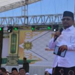 Menteri Agama Yaqut Cholil Qoumas yang hadir mewakili Presiden Jokowi dalam Tablig Akbar Idul Khotmi Nasional Thoriqoh Tijaniyah ke-231 di Garut, Jawa Barat. Foto: Kemenag