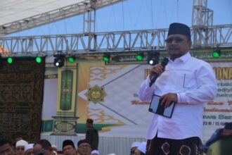 Menteri Agama Yaqut Cholil Qoumas yang hadir mewakili Presiden Jokowi dalam Tablig Akbar Idul Khotmi Nasional Thoriqoh Tijaniyah ke-231 di Garut, Jawa Barat. Foto: Kemenag