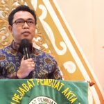 Kepala Seksi Penetapan Hak dan Pendaftaran Riyanto S. Tosse mewakili Kepala BPN Kota Depok Indra Gunawan saat menyampaikan sambutan dalam HUT IPPAT ke-36 wilayah Kota Depok, di Margo Hotel, Kamis 19 Oktober 2023.