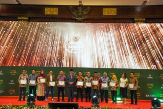 PT Bank Rakyat Indonesia (Persero), Tbk mendapatkan anugerah BAZNAS Award 2024 kategori Bank Penyedia Layanan Pembayaran Zakat Terbaik. Foto: Dok BRI