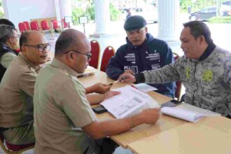 Sejumlah ASN pemprov DKI Jakarta saat melaksanakan aktivitas pelayanan. Foto: dok pemprov