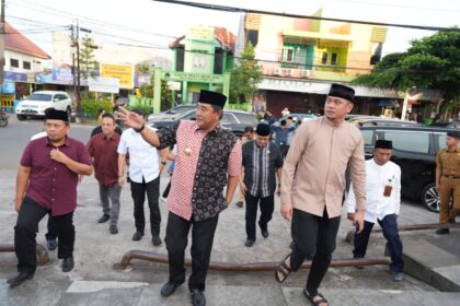 Pj Gub Sulsel (tengah) bersama Bupatu Gowa Sulsel. Foto: Dok Humas