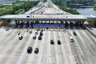 Tampak gerbang tol Cikampek Utama saat libur Hari Waisak. Foto: JM