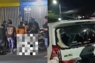 Mobil yang diduga digunakan berbuat mesum menabrak motor polisi. Foto: IG, @jemberawesome (tangkap layar)