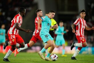 Foto: Aksi Fermin Lopez dalam laga La Liga antara Almeria vs Barcelona, Jumat (17/5/2024). (c) AP Photo/Jose Breton