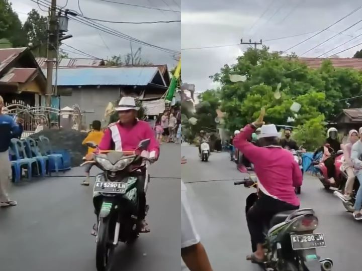 Seorang pria yang menggunakan motor membagikan gepokan uang utuk pembangunan Masjid di Desa Marias. Foto: IG, @memomedsos (tangkap layar)