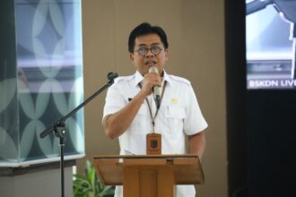 Pelaksana Harian (Plh.) Pusat Strategi Kebijakan (Pustrajakan) Kewilayahan, Kependudukan dan Pelayanan Publik (KKPP) BSKDN Faisal Syarif saat menutup Forum Diskusi Aktual (FDA) Strategi Percepatan Penurunan Angka Kemiskinan Ekstrem di Daerah.