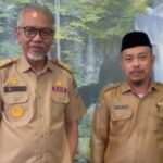 Yusuf Tahir (kanan) bersama Plt Kepala Badan Kesbangpol Sulbar, Herdin Ismail. Foto: Ist