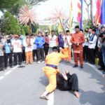 Wali Kota Jakarta Timur (Jaktim), M. Anwar bersama anggota DPRD DKI Jakarta, Syahroni menghadiri Festival Batu Penggilingan II 2024, di Cagar Budaya Batu Penggilingan, Jalan Kali Buaran, Kelurahan Penggilingan, Kecamatan Cakung, yang diadakan pada Jumat (23/8/2024). Foto: Ist