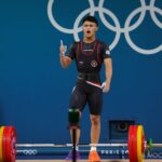 Lifter andalan Indonesia Rizki Juniansyah berhasil menyumbangkan medali emas kedua bagi Tim Indonesia di Olimpiade 2024. Rizki bukan hanya tercatat sebagai atlet kedua yang merebut emas setelah atlet panjat tebing Veddriq Leonardo tetapi juga mengukir tinta emas sebagai lifter pertama Indonesia yang meraih emas di Olimpiade.(foto:NOC Indonesia/Naif Muhammad Al'as)