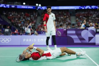 Ganda Putra Indonesia Fajar Alfian/Muhammad Rian Ardianto akhirnya tersingkir dari perempat final bulutangkis ganda putra Olimpiade 2024 Paris usai kalah 22-24, 20-22 dari Liang Wei Keng/Wang Chang (China) di Porte de la Chapelle Arena, Kamis (1/8). (Foto: NOCIndonesia/Naif Muhammad Al'as)