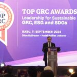 M Lutfi Handayani saat memberi sambutan dalam Top GRC Award 2024. Foto: topbusiness