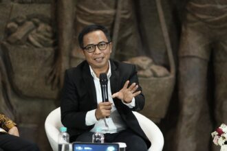 Direktur Kepatuhan BRI A Solichin Lutfiyanto dalam acara Penguatan BUMN Menuju Indonesia Emas: Memaksimalkan Peran Jasa Keuangan di Era ESG. Foto: Dok BRI