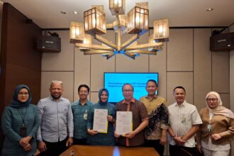 Kantor Cabang BPJS Ketenagakerjaan Jakarta Mangga Dua menandatangani MoU dengan Pengurus Besar Jujitsu Indonesia tentang penyelenggaraan program Jamsostek bagi olahragawan maupun pelaku olahraga. Foto: Ist