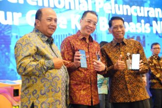 Sinergitas Bank Mandiri dan PT Kereta Api Indonesia (Persero) atau KAI Group diwujudkan dengan memperluas solusi perbankan digital di ekosistem transportasi. Foto: Dok Bank Mandiri