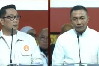 Ridwan Kamil dan Dharma Pongrekun dalam debat kedua Pilkada Jakarta 2024, Minggu (27/10/2024).. Foto: Tangkapan layar Youtube KPU DKI