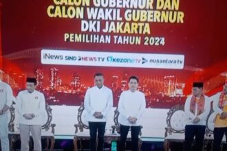 Tiga pasangan cagub saat acara debat cagub di JIExpo, Kemayoran.(foto jepretan tv inews)