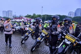 Ilustrasi petugas kepolisian yang bakal berjaga di venue debat cagub.(Foto istimewa)