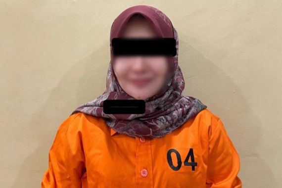 Tersangka MD alias ML di Polda Aceh. (Bidhumas Polda Aceh)