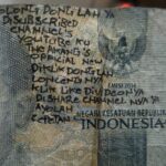 Salah satu contoh uang rupiah dicoret-coret. Foto: X, @tanyakanrl (tangkap layar)