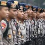 Ilustrasi ratusan personil polisi yang mengamankan rekapitulasi pilkada Jakarta 2024.(Foto istimewa)