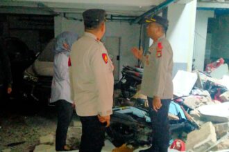 Polisi mengamankan dan melakukan olah TKP di tempat Pijat dan Spa Winners di Jalan Lamandau Raya, No. 23, Kelurahan Kramat Pela, Kecamatan Kebayoran Baru, Jakarta Selatan, pada Rabu (11/12/2024). Foto: Ist