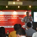 SVP Group Sustainability and Corporate Communication Telkom Ahmad Reza dalam pelatihan optimalisasi artificial intelligence (AI) untuk UMKM lokal dengan tema "Inovasi AI untuk UMKM: Semakin Cuan Berkat Digitalisasi,” yang digelar di Denpasar, Rabu (11/12/2024). Foto: Dok Telkom Indonesia