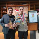 Kapolsek Metro Kebayoran AKBP Dr. S.F. Aritonang, S. Sos, MH Pecahkan Rekor MURI Terbanyak Ciptakan 155 Lagu Edukasi untuk Generasi Muda Bangsa. Foto/ist