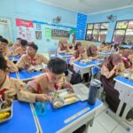 Ilustrasi sarapan gratis bagi murid.(Foto Kemenkopolkam)