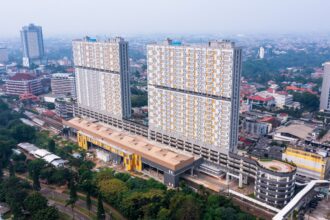 Salah satu hunian vertikal perumnas yang berkonsep TOD menyatu dengan stasiun commuter. Foto: perumnas.co.id