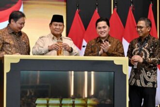 Direktur Utama PT Pegadaian, Damar Latri Setiawan, saat pengenalan Bank Emas bersama Presiden Praboso Subianto, Meneg BUMN Erick Thohir, dan Menko Perekonomian Airlanggan Hartarto. Foto: Ist