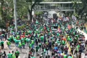 Aksi demonstrasi para pengemudi ojek online.(Foto screenshot YT)