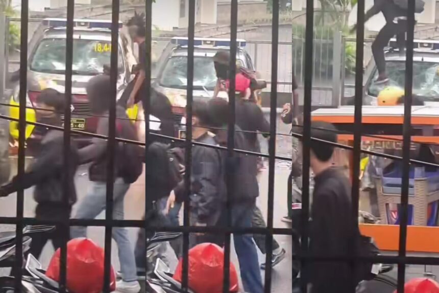 Aksi damai May Day Bandung berubah mencekam usai massa hitam menyerang polisi dan rusak mobil patroli di kawasan Dago, Bandung, Jawa Barat. Foto: Tangkap layar IG @medsos_rame