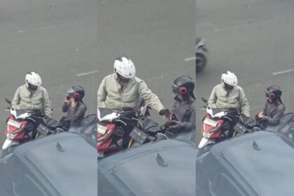 Oknum polisi meminta pungutan liar ke pengendara motor wanita di kota Medan. Foto: Tangkap layar X @heraloebss