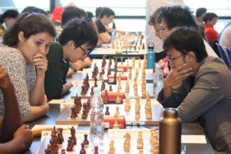 IM Aditya Bagus Arfan vs WGM Lena Georgescu pada babak kelima Turnamen Master Open (MTO) di Biel Chess Festival, Swiss. Foto oleh Kristianus Liem.