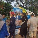 BPJS Ketenagakerjaan Kantor Cabang Jakarta Rawamangun melakukan sosialisasi kepada para pedagang dan pengunjung di kawasan Banjir Kanal Timur (BKT), Jakarta Timur, Minggu (20/7/2025). Foto: Ist