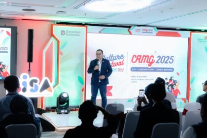 Direktur Human Capital Management Telkom Henry Christiadi dalam acara Culture Festival TelkomGroup 2025 yang mengusung tema "Langkah Cepat, Tumbuh Bersama". Foto: Telkom Indonesia