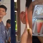 Siswa pegang potongan semangka super tipis dari menu Program Makan Bersama Gratis (MBG). Foto: TikTok @happyeverafter702
