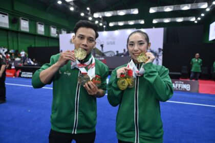 Muhammad Daffa "Golden Boy" Hidayatullah dan Jennifer Tjahyadi (Jawa Timur/Wushu)
