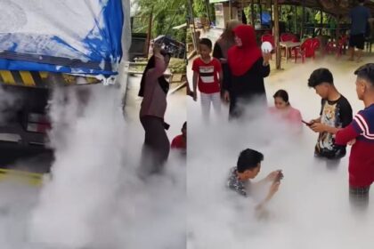 Truk pengangkut oksigen cair mengeluarkan asap putih tebal di Jalan Lintas Cikampak, Labuhan Batu Selatan. Foto: Tangkap layar IG @info_jabodetabek