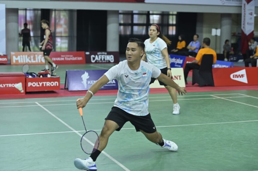 Hikmat Ramdani/Leani Ratri Oktila menyumbangkan medali emas dari nomor Ganda Campuran SL 3 - SU 5 untuk Indonesia setelah mengalahkan rekan senegara mereka, Fredy Setiawan/Khalimatus Sadiyah di final Polytron Indonesia Para Badminton International 2025. Foto/megapro