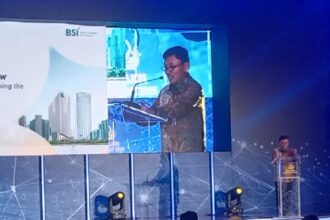 Dirut PT Pegadaian, Damar Latri Setiawan saat menyampaikan sambutan. Foto sofian/ipol.id