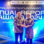 Bank Mandiri meraih Juara 1 Kategori BUMN Go Publik Keuangan pada ajang Annual Report Award (ARA) 2024. Foto: Dok Bank Mandiri
